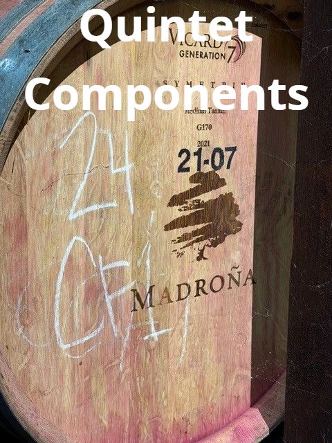 A barrel head chalked with the lot numbers 24 CF1 and 21-07. Text on the photo reads Quintet Components